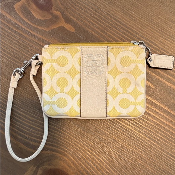 Coach Handbags - Coach Yellow Signature Jacquard Wristlet with Cream Leather Trim